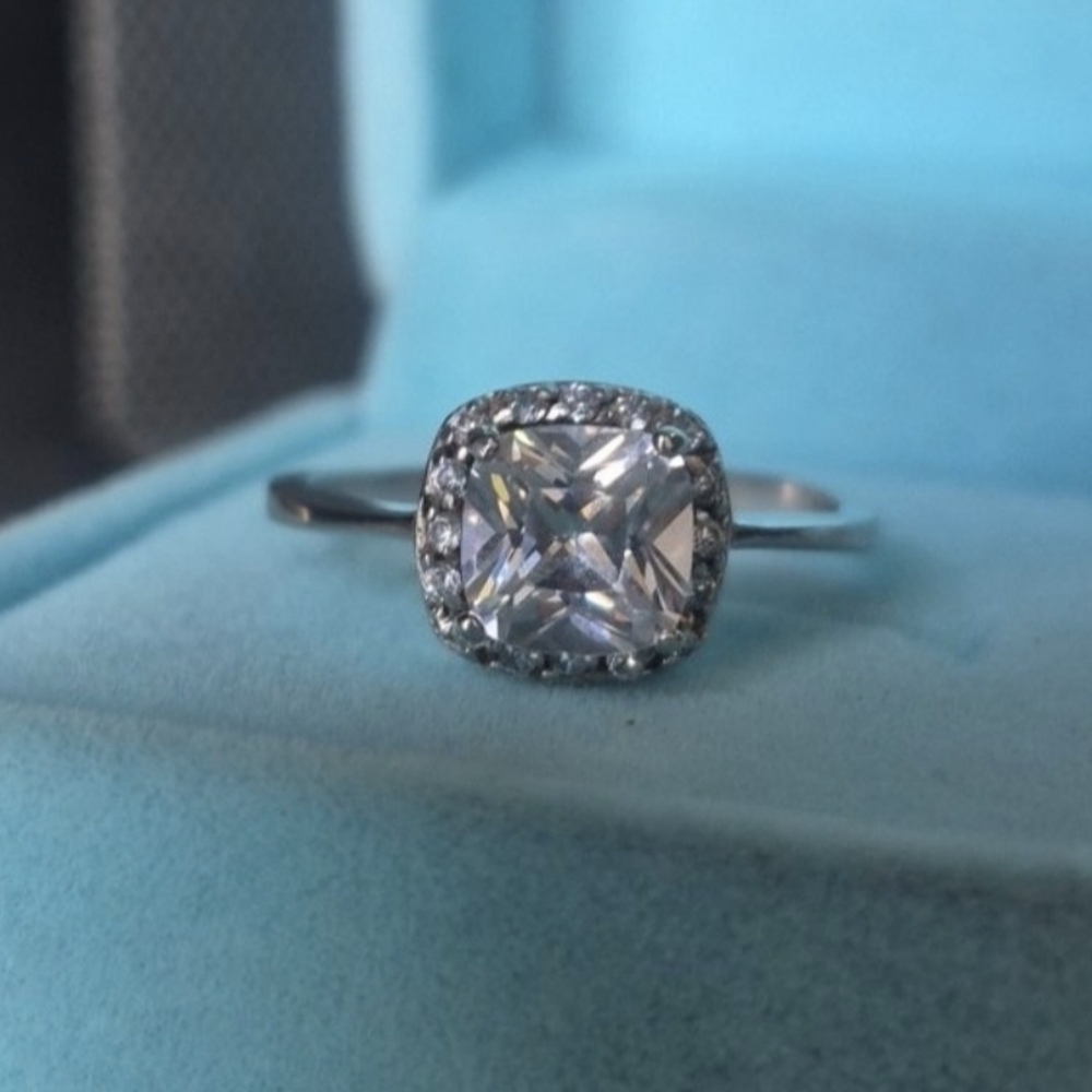 White Cushion Halo Solitaire Ring - [Brand]